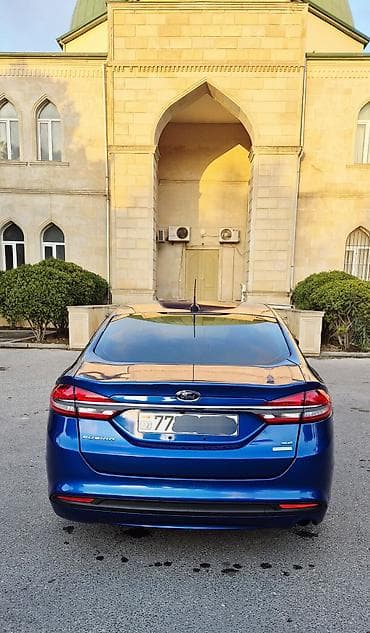 Ford: Model: Ford Fusion (mavi sedan) Texniki xüsusiyyətlər və təchizat: - — 9