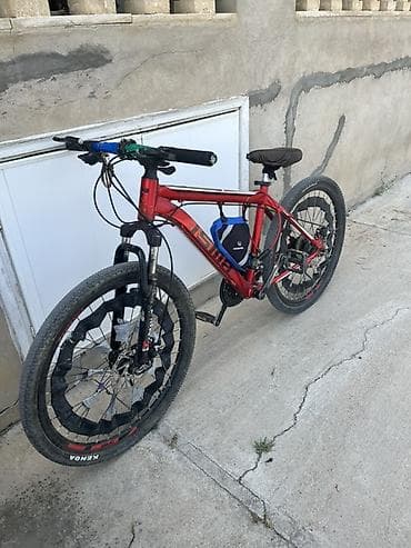 suktur: Qırmızı rəngli dağ velosipedi - Alüminium gövdə, ismi “ISIME” yazılı — 1