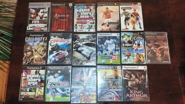 playstation kirayesi: Sony PlayStation 2 konsolu, iki ədəd DualShock oyun pultu və bir neçə — 2