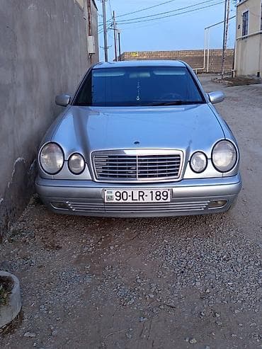 skoda: Mercedes-Benz E-Class: 2.4 l | 1998 il Sedan — 1