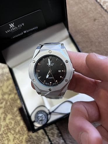 saat remeni: Hublot Geneve kişi qol saatı – kvarz mexanizmli, şık və minimal — 4