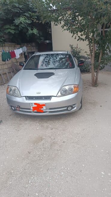 diffuzor: Hyundai Coupe (Tiburon) – gümüş rəngli 2 qapılı sport kupe hazir — 2