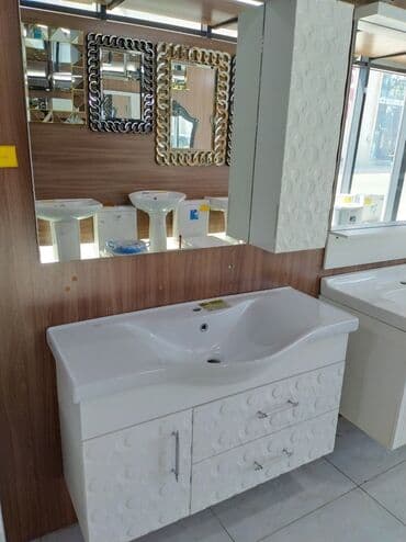 Vanna otaqları üçün nəzərdə tutulmuş bu dolablı lavabo modeli, ağ