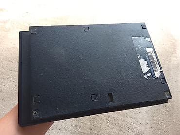 kitab alan: Sony PlayStation 2 Slim (PS2 Slim) oyun konsolu - Model: SCPH-7xxxx — 2