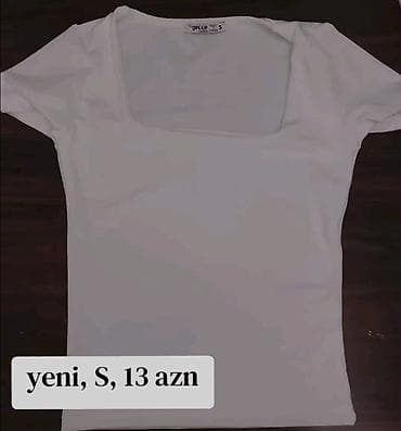 Ağ rəngli qadın köynəyi