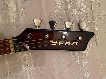 Gitaralar: Akustik gitara, 4 sim, İşlənmiş, Ünvandan götürmə — 1