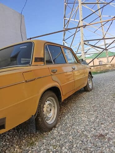 nol 6 qiymeti: VAZ 2106 sedan - Korpus: 4 qapılı sedan, sarı rəng, xrom yan — 3