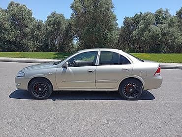 Nissan Sunny: 1.6 l | 2008 il Sedan — 3