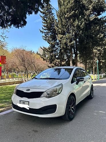 opel f astra: Kia Rio: 1.4 l | 2013 il Sedan — 3