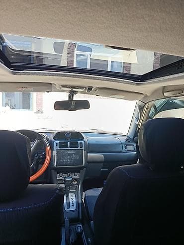 mitsubişi: Mitsubishi Pajero iO 2000 il 2 motor gümüş rəngli, 5 qapılı SUV. - — 3