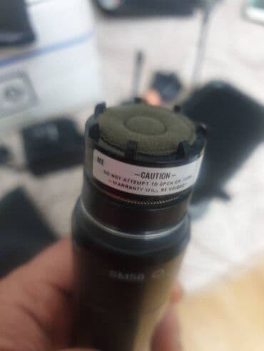 Гитары: SHURE PGX SM 58 Azərbaycanda 400-700 MHZ normal işləyir Shure — 1