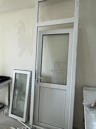 pvc qapilar: PVC profil şüşəli qapı və üst fanlı panel
247/79 — 1