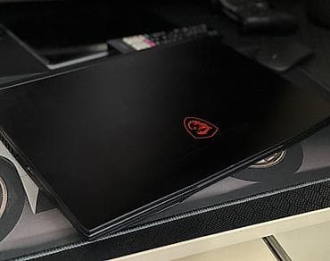 en ucuz mac: MSI oyun noutbuku - Model: MSI (qara korpus, qırmızı ejder loqosu və — 4