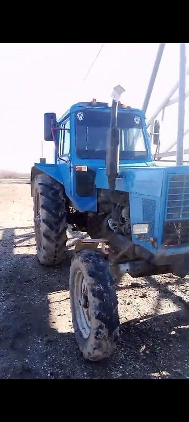 traxdir tekeri: Məhsul: Traktor + ot bağlayan pres (saman presi) qoşqu Təsvir: - Kənd — 2