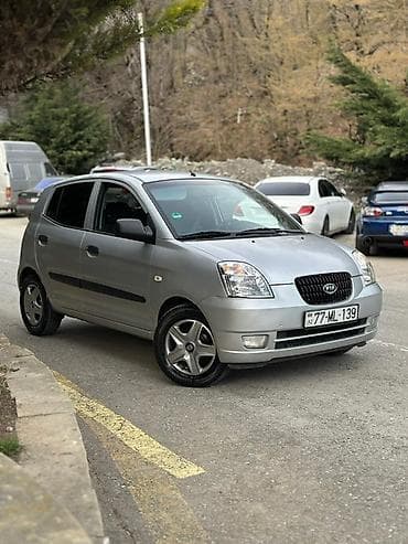 ninja h2r qiymeti: Kia Picanto, gümüşü rəng, 5 qapılı heçbek. Avtomobil çox ekanom va — 2