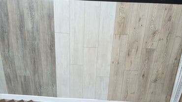 Ламинат: Məhsul: Laminat döşəmə örtükləri və aksesuarları Təsvir: - Mağazada — 3