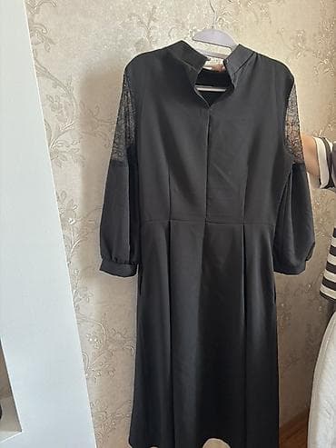 platin: Qara rəngdə zərif qadın donu - Model: midi uzunluqda, yüngül A-kəsim — 3
