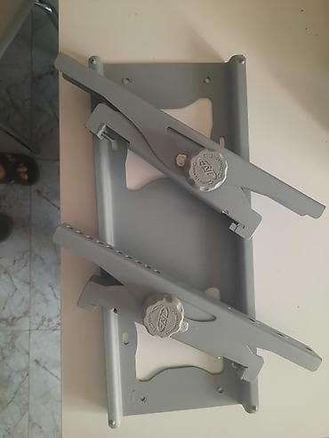 Məhsul: Tənzimlənən divar üçün TV/monitor dayağı Təsvir: - Metal