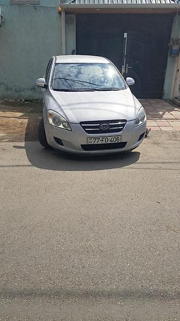 orta panel: Kia Ceed: 1.6 l | 2007 il Hetçbek — 6