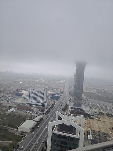 Sənaye alpinizmi xidməti – hündürmərtəbəli binalarda şüşə fasadların