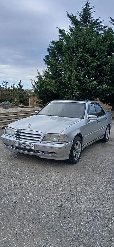 opel astra 2017: Mercedes-Benz C‑Class W202 sedan – gümüş rəng. Masin yaxsi — 8