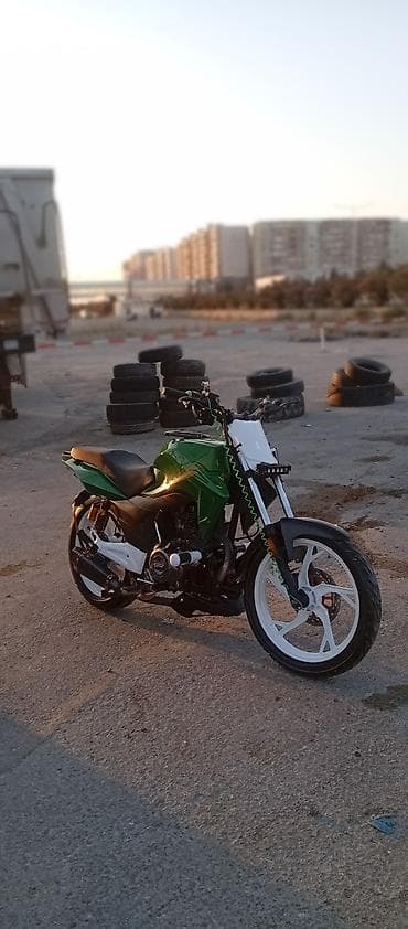 mini cps: Modifikasiya olunmuş şəhər/naked tərzli motosiklet Xüsusiyyətlər: - — 1
