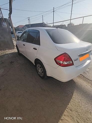 185 75 16: Nissan Tiida Latio sedan Salam Bez kraska deyil əziyi olubda düzəlibdə — 6