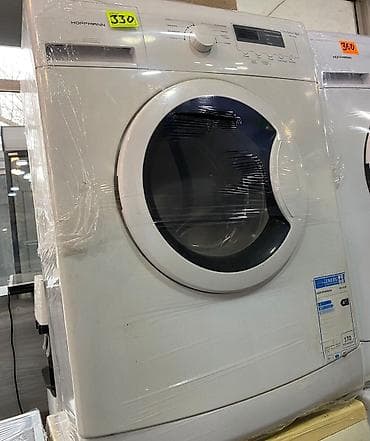 Soyuducu Paltaryuyan televizor vitrinlerin satış mərkəzi: Hoffmann markalı, öndən yükləmə tipli paltaryuyan maşın. Ağ rəngli