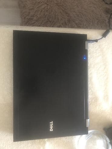 vətən komputer: Dell noutbuk - Brend: Dell (qara korpus, klassik biznes dizayn) - — 2