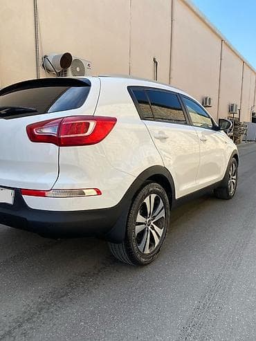 doogee dg550 dagger: Kia Sportage: 2 l | 2010 il Krossover — 5