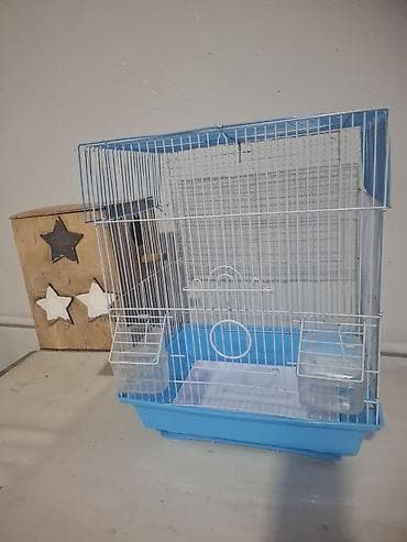 Quş qəfəsi – - Material: möhkəm metal barmaqlıqlar, plastik baza -