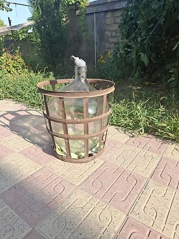 Şüşə qab 50 lt,dəmir səbəti ilə birlikdə satılır 35 m,şərəb və ya — 3