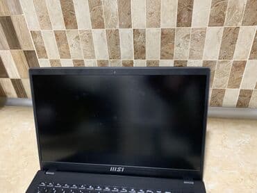 ноутбук ремонт на дому: MSI noutbuk Xüsusiyyətlər və detallar: - Ekran: 15.6" (nazik — 7
