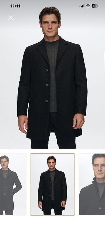 Kişi üçün klassik qara palto Trend yoldan sifariş olunub . ölçüsü səhv