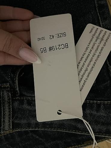 romanson saat bakida: Geniş kəsimli tünd mavi cins şalvar - Model: wide-leg/straight geniş — 2