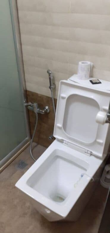 tam temirli menziller: İnşaatçılar metrosunun çıxısında inşaat binasında 12 mertebeli — 24