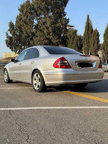 disk 18: Mercedes-Benz E-Class: 3.2 l | 2005 il Sedan — 4