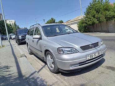 Nəqliyyat: Opel Astra: 1.8 l | 1999 il 554000 km Universal — 4