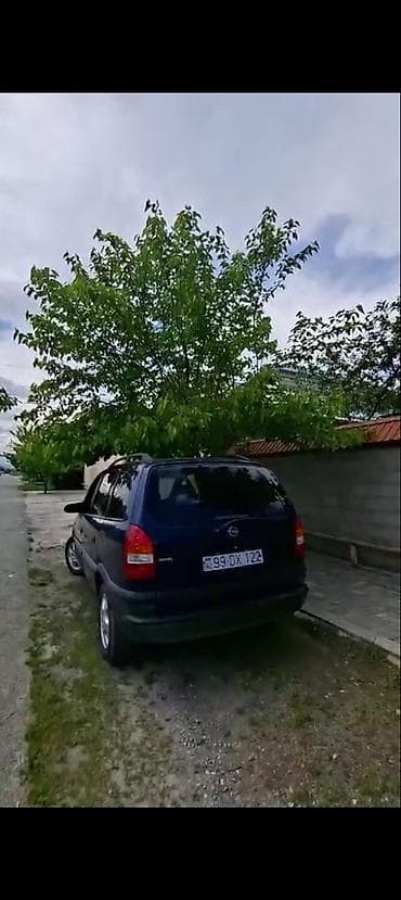 Opel Zafira, tünd mavi, 7 yerlik kompakt miniven. - Geniş salon və