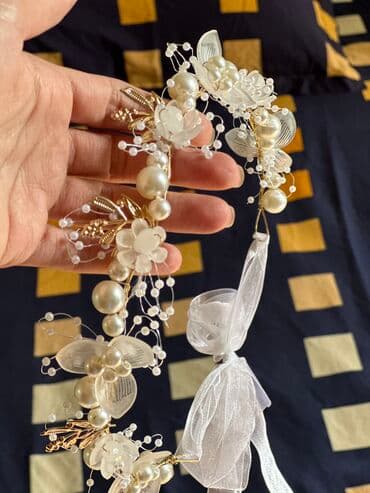 xari bulbul sancaq: Taclar — 2