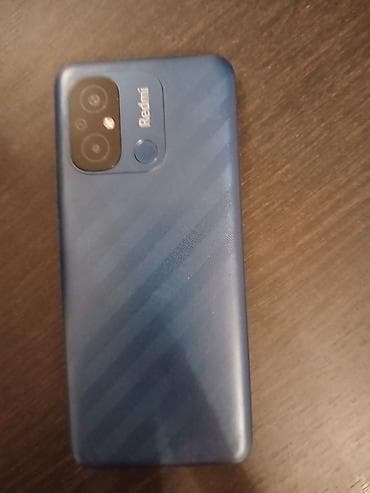 телефон fly fs502 cirrus 1: Redmi smartfon - Model: Redmi (mavi arxa qapaq, arxa paneldə barmaq — 2