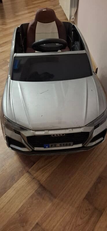 masin ucun xor xor: Uşaqlar üçün nəzərdə tutulmuş bu elektrikli minik avtomobili gümüşü — 1