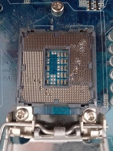 asus rog srtix: Burada gigabyte nin H61 ana palatası görsənir sadəcə CPU yerinde — 2