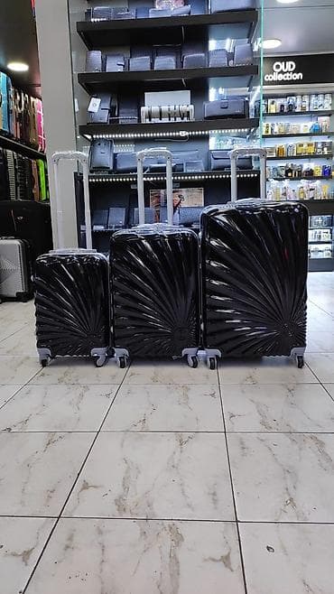 İdman və istirahət: Sərt korpuslu 3-lük çamadan dəsti – qara rəng, parlaq spiral relyef — 1