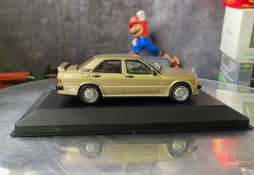 metbex tavan modelleri: Коллекционная модель Mercedes-Benz 190E 2.3 16V W201 gold 1984 EDICOLA — 9