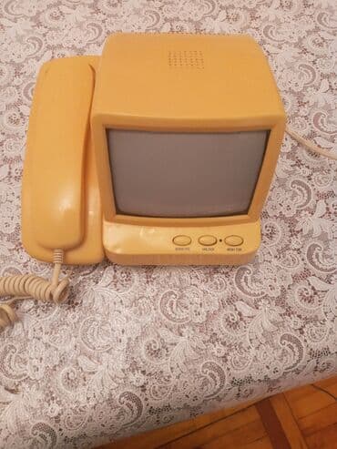 Stasionar telefon Simli