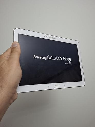 sari nomre: Samsung Galaxy Note 10.1 (2014 Edition) planşet tep teze vaziyyetdedi — 1
