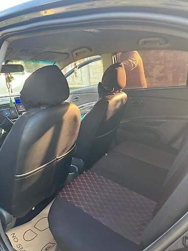 Kia: Kia Rio: 1.4 l | 2007 il Sedan — 10