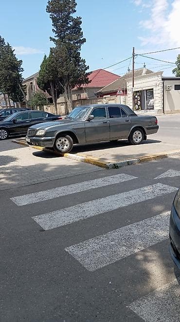 qaz 63: GAZ-31105 Volga sedan - Kuzov: 4 qapılı sedan, tünd boz (metallic) — 4