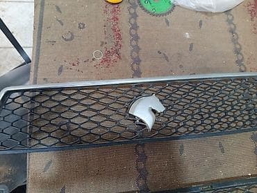 Облицовки, решетки: Məhsul: Avtomobil ön radiator barmaqlığı (bal pətəyi naxışlı), loqo — 2